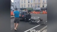 Police investigating vigilante who flung bike in front of moving car