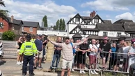 Anti-migrant protesters hurl abuse as rival groups clash in Horley