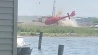 Watch: Helicopter flips and crash lands outside Michigan restaurant