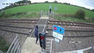 Teenager’s terrifying near-miss with oncoming train captured on video