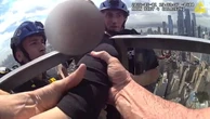 Watch: NYPD scale side of skyscraper to rescue woman 54-stories in air