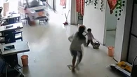 Moment girl, 11, narrowly saves baby sister from runaway vehicle