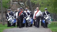 Ed Davey twirls baton in marching band to kick off Lib Dem conference