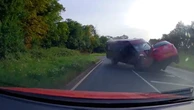 Moment wrong-way minibus driver smashes head-on into car