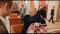 Putin hugs former high school teacher in new Kremlin video