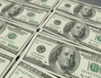 Dólar opera em alta e encosta em R$ 6; Ibovespa registra queda