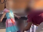Homem derruba criança e pega pelo colarinho em festa junina no DF; vídeo