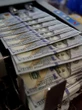Dólar apresenta estabilidade com expectativa por alternativas ao IOF
