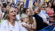 Israelenses celebram libertação de reféns divididos entre alívio e tristeza