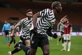 Pogba downs Milan to send Man United into Europa League last 8