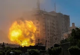 Gaza conflict: Fighting between Israel and Hamas abates slightly as truce calls mount
