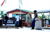 5 studente agter tralies weens betogings by WSU