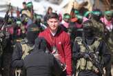 Flanked by masked gunmen, Israeli hostages address Gazans before release