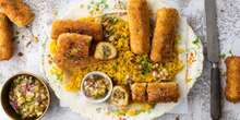 Bobotie and potato croquettes with yellow rice and banana salsa