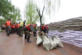 Erge vloede in Beijing eis 30