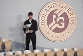 Alcaraz plays down chasing 'impossible' Nadal, Djokovic records