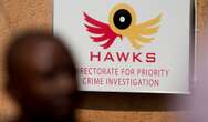 Hawks arrest five people in murder, drug dealing investigation