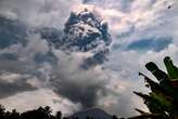 Indonesia's Mount Ibu erupts as disaster agency warns of possible floods, cold lava flow