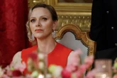 Macrons die ene glimlagte op besoek aan Pienk Paleis in Monaco