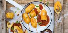 Boerewors vetkoek lollies with a tomato dip