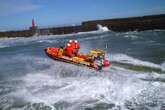 NSRI red man wat oorboord val