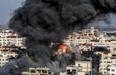 Israel pounds Gaza to curb Palestinian militants but rockets still fly in day 5 of the conflict