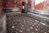 Ontdekking van badhuis in antieke stad Pompeii dui op weelderige lewe