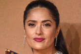 Salma Hayek meditates with her pet owl who likes wine