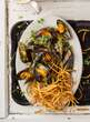 Citrusy mussels with sweet potato chips