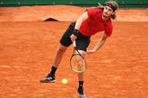 Tsitsipas powers into French Open last 32