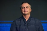 Oudpres. Bolsonaro van Brasilië moet monitortoestel dra, gelas hof