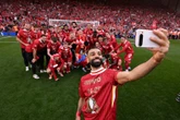 Mo Salah weer Premierliga se beste; Slot sê hy gaan nêrens