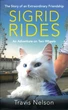 Dié kat kom weer . . . want sy ry fiets saam met haar meester