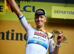Merlier wen Tour de France se 3de skof te midde van chaos