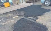 Supervisor arrested, four eThekwini workers suspended for laying asphalt at private residence