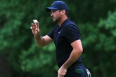 Jason Day grabs Travelers lead despite sore back with Bubba one back