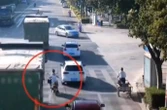 Scooter rider in miraculous escape