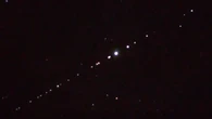 'Space train’ spotted crossing night sky