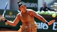 Osaka sparkles in golden French Open outfit