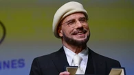 John Travolta tears up while receiving Honorary Palme d’Or at Cannes: ‘This is beyond the Oscar’