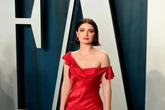Eve Hewson says being raised by U2’s Bono took fame ‘off of a pedestal’