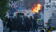 Clashes erupt as police use water cannon near Belfast