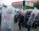 Petrol bombs and bricks hurled at Mexican police during pre-match unrest at Azteca