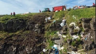 Rescue team's 12-hour operation to clear 'river of rubbish' from mountain beauty spot