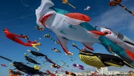 Giant dragon and octopus kites fill Danish skies