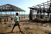 ‘The sea took everything away’: how Nigeria’s ‘Happy City’ is disappearing beneath the waves