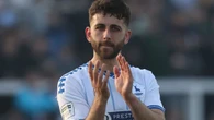 Pools midfielder Hunter extends stay