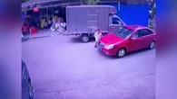 Man hit by car after trying to avoid driverless truck