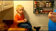 Stubborn toddler eats raw onion