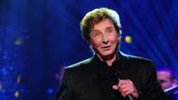 Part of claim against Barry Manilow to be paused in England, judge rules